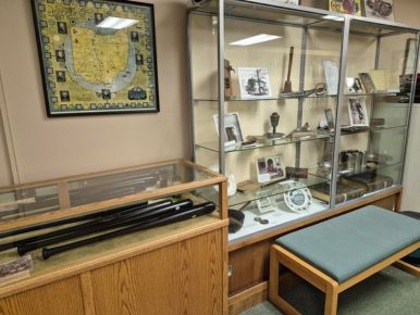glass display case with historical objects