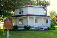 Color photo of the Darrow Octagon House located at 8405 Main Street in Kinsman, Ohio