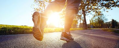 Feet Running on Pavement